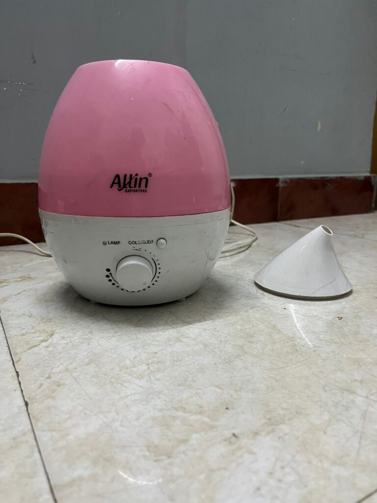 humidifier with lid opened at the top